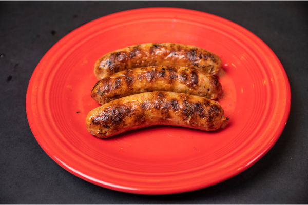 “Scarlet’s” Bratwurst with cheese $9.00 per package