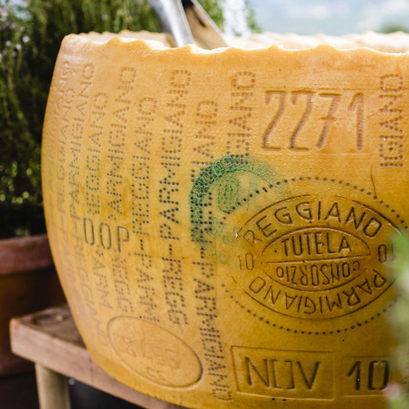 Live Parmesan Wheel Cracking
