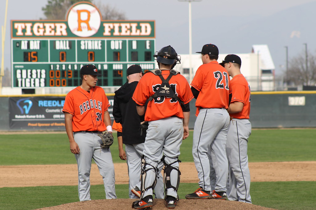 Reedley College Baseball player during a mound visit 